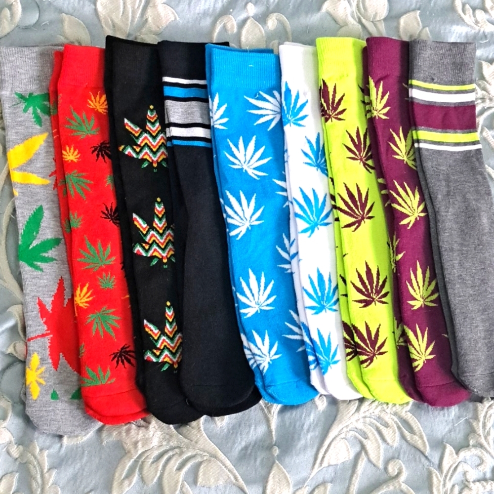 9 separately sold pair of multi colored Odd socks.